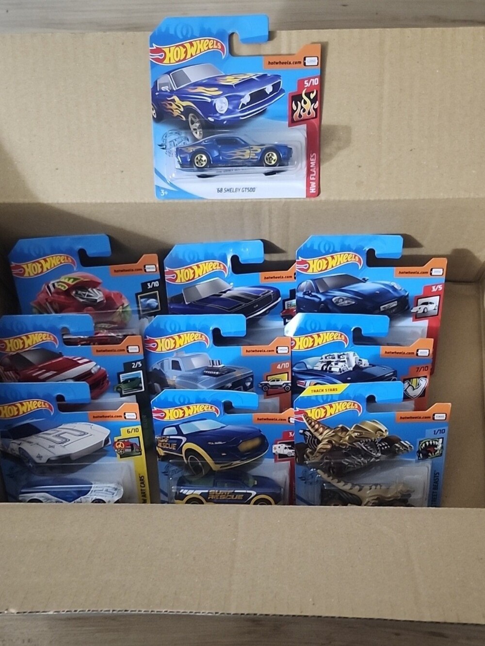 Hot Wheels Qty 10 + Hot Wheels Box
